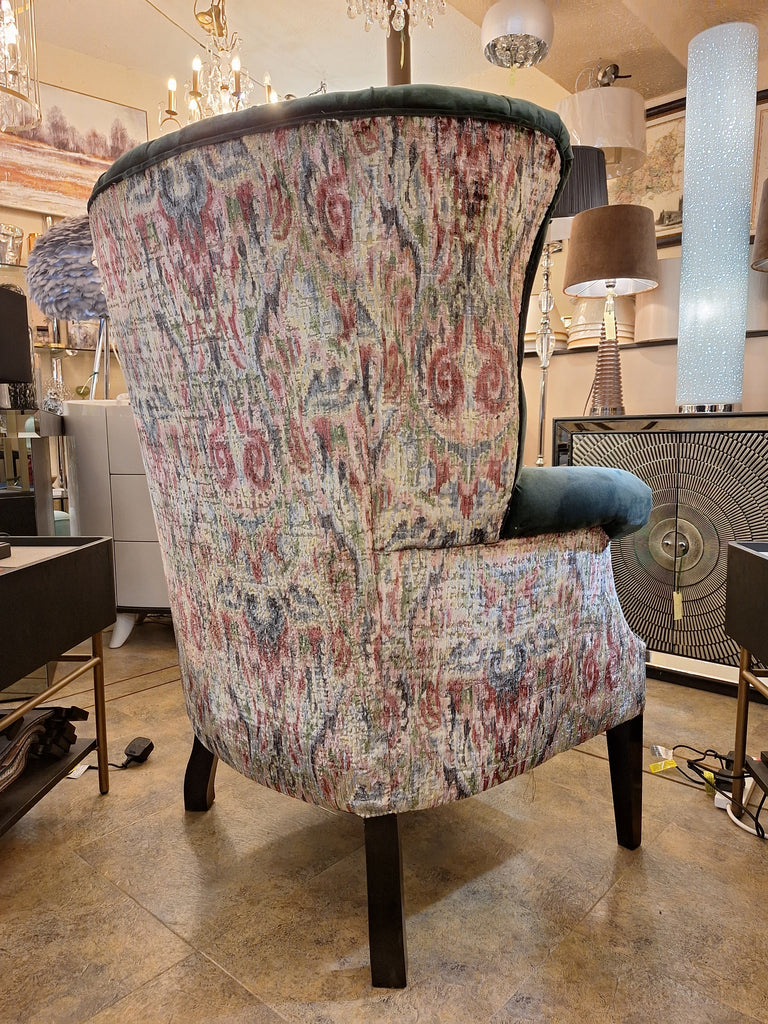 Dark Green Velvet Armchair with Vibrant Accent
